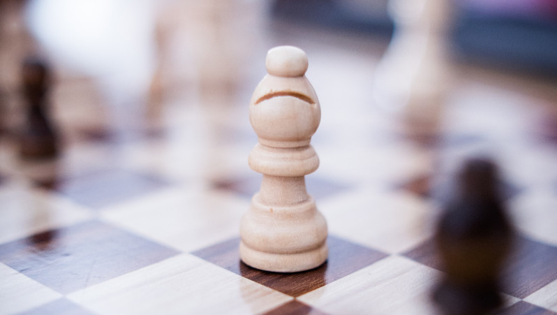 A chess piece on a board