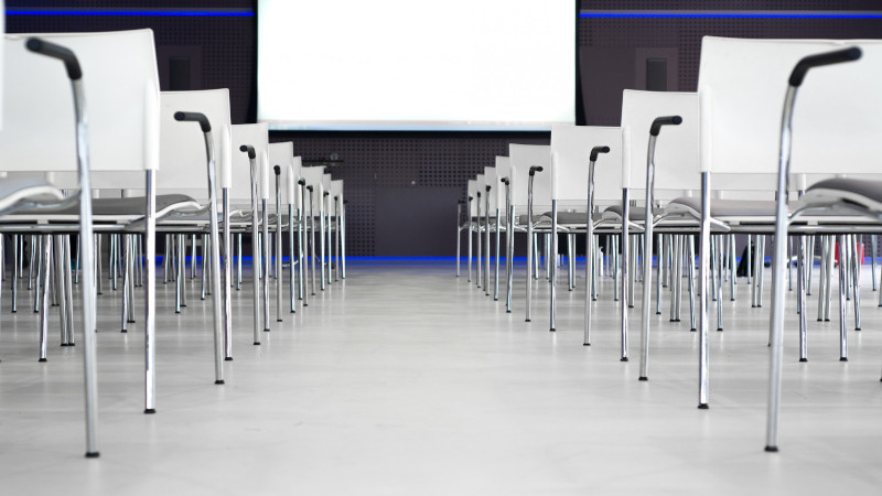 Rows of chairs in a hall